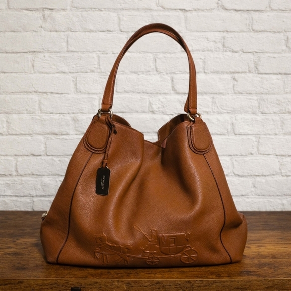 Coach Handbags - Coach Edie  Brown Leather Embossed Horse And Carriage Bag